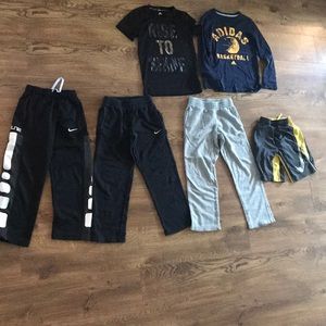 Boy’s lot size 7, 3 Nike sweat pants, 1 Nike Short